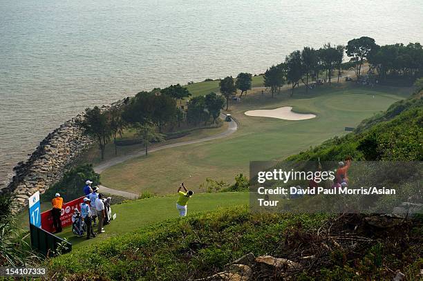 Prom Meesawat of Thailand hits his tee shot on the 17th hole during the Venetian Macau Open 2012 at the Macau Golf and Country Club on October 14,...