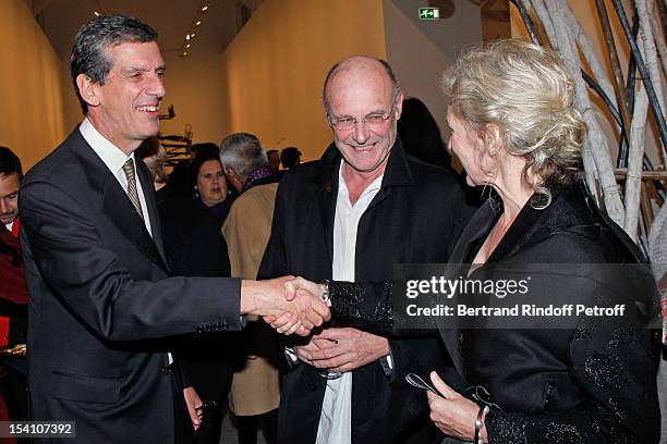 Henri Loyrette, President of the Louvre museum, artist Anselm Kiefer and Kiefer's companion Renate Graf attend the opening of Thaddaeus Ropac's new...