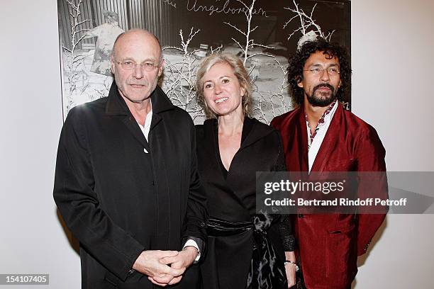 Artist Anselm Kiefer, his companion Renate Graf and Haider Ackermann attend the opening of Thaddaeus Ropac's new gallery on October 13, 2012 in...