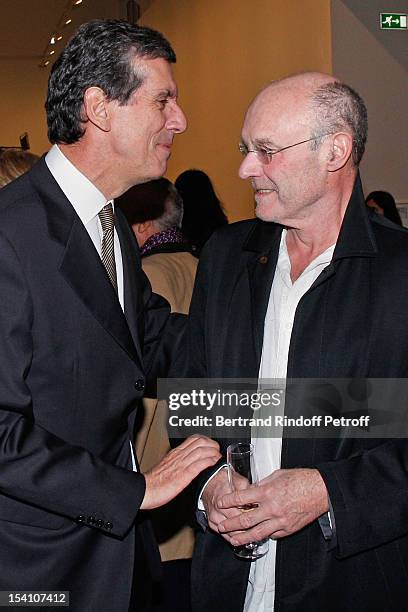 Henri Loyrette, President of the Louvre museum and artist Anselm Kiefer attend the opening of Thaddaeus Ropac's new gallery on October 13, 2012 in...