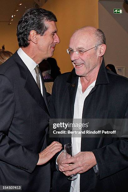 Henri Loyrette, President of the Louvre museum and artist Anselm Kiefer attend the opening of Thaddaeus Ropac's new gallery on October 13, 2012 in...