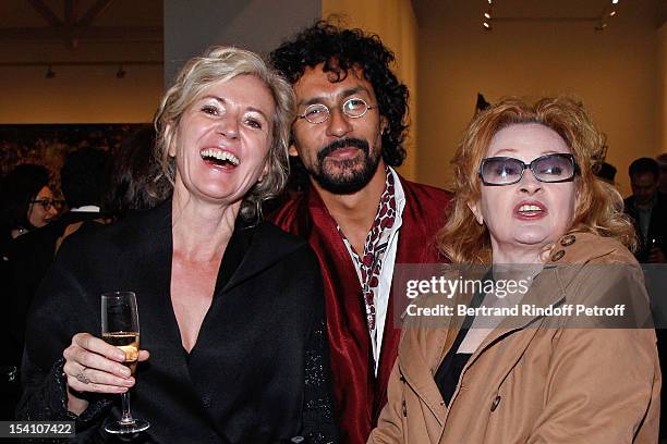Artist Anselm Kiefer's companion Renate Graf, Haider Ackermann and Ingrid Caven attend the opening of Thaddaeus Ropac's new gallery on October 13,...