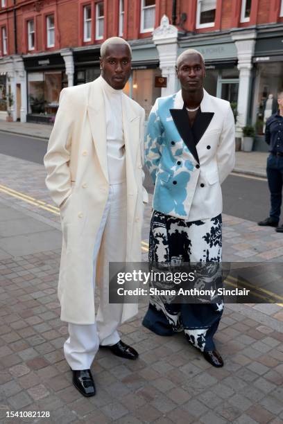 The Flag Twins arrive at the British Vogue x self-portrait Summer Party at Chiltern Firehouse on July 13, 2023 in London, England.