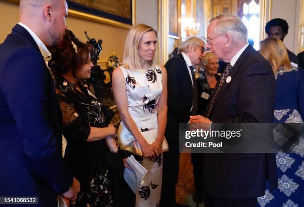 The Duke of Gloucester meets with Beth Cordingly , Helena Bonham Carter and Connor Allen during the reception to celebrate the work of William...