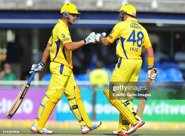 Faf du Plessis and Mike Hussey of CSK during the Champions League Twenty20 match between Chennai Super Kings and Sydney Sixers at Bidvest Wanderers...