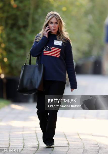 Becky Quick, co-anchorwoman of CNBC's financial news shows Squawk Box, walks to a morning session Allen & Company Sun Valley Conference on July 13,...