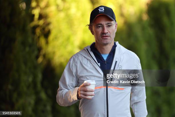 Alex Karp, CEO of Palantir Technologies, walks to a morning session at the Allen & Company Sun Valley Conference on July 13, 2023 in Sun Valley,...