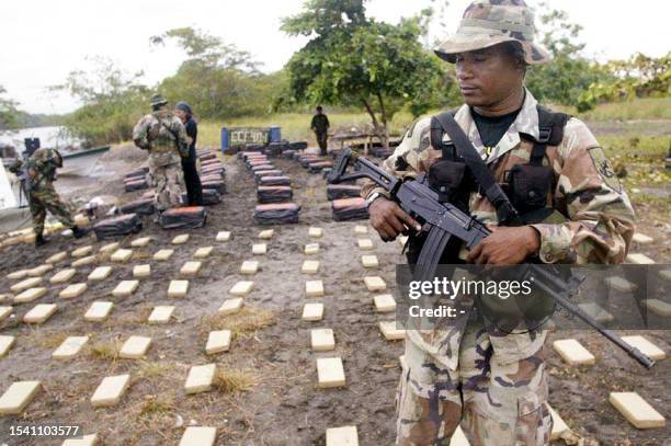 Colombian government marine guards part of four tons of cocaine 13 September 2002 in Cabo Manglares, Colombia, near the border with Ecuador. The...