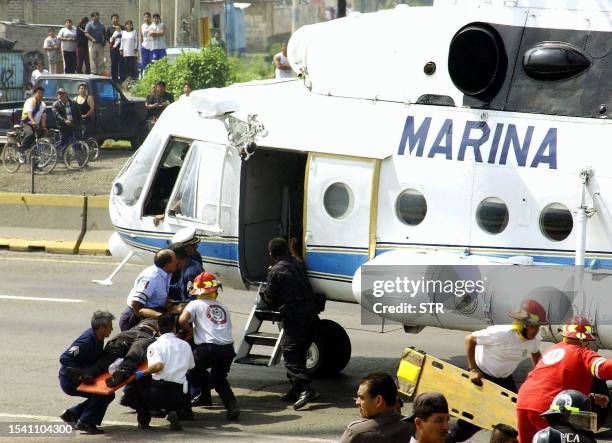 Mexian Navy cadets receive treatment 17 September 2002 in Mexico City after becoming ill due to suspected food poisoning. More than 40 cadets were...