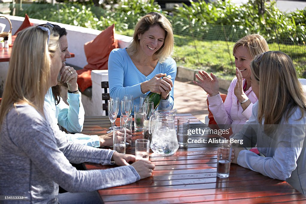 Women having fun at a meal together