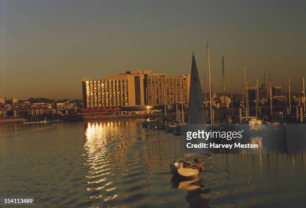 The marina in San Diego, California, with the Sheraton Hotel in the background centre, USA, January 1975.