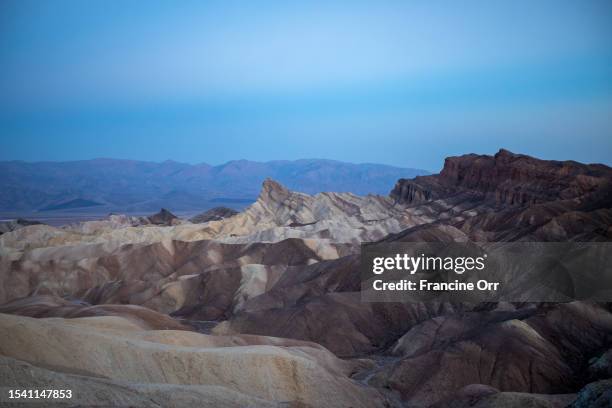 Death Valley, CA Sunrise at Zabriskie Point in Death Valley National Park on Tuesday, July 18 in Death Valley, CA.