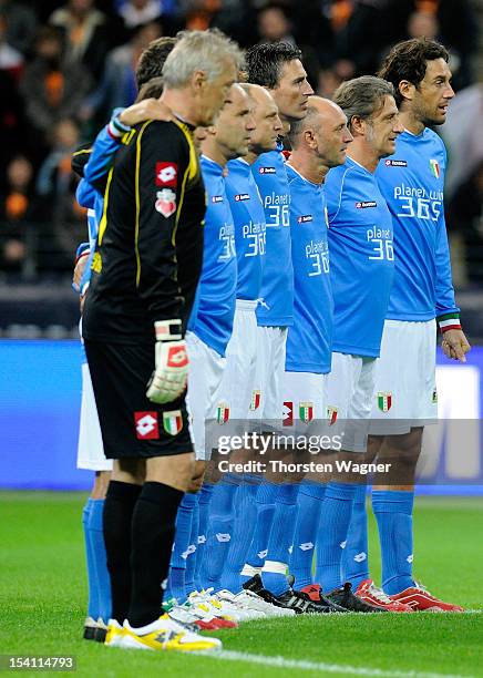 Moment of silence is pictured prior to the century match between Germany and Italy at Commerzbank Arena on October 14, 2012 in Frankfurt am Main,...