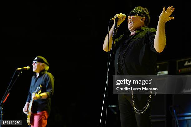 Mike Reno and Paul Dean of Loverboy perform at Cruzan Amphitheatre on October 13, 2012 in West Palm Beach, Florida.