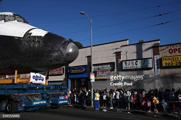 Space Shuttle Endeavour goes down Martin Luther King Boulevard to the California Science Center on October 14, 2012 in Los Angeles, California....