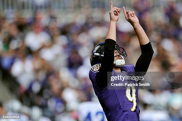 Place kicker Justin Tucker of the Baltimore Ravens celebrates after kicking a field goal against the Dallas Cowboys in the first quarter at M&T Bank...