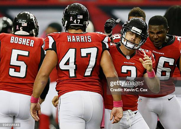 Matt Bryant of the Atlanta Falcons celebrates after kicking the go-ahead field goal in the final seconds against the Oakland Raiders at Georgia Dome...