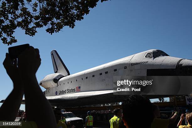 Space Shuttle Endeavour goes down Martin Luther King Boulevard to the California Science Center on October 14, 2012 in Los Angeles, California....