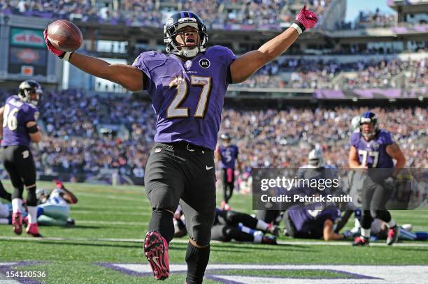 Running back Ray Rice of the Baltimore Ravens scores a touchdown against the Dallas Cowboys in the fourth quarter at M&T Bank Stadium on October 14,...
