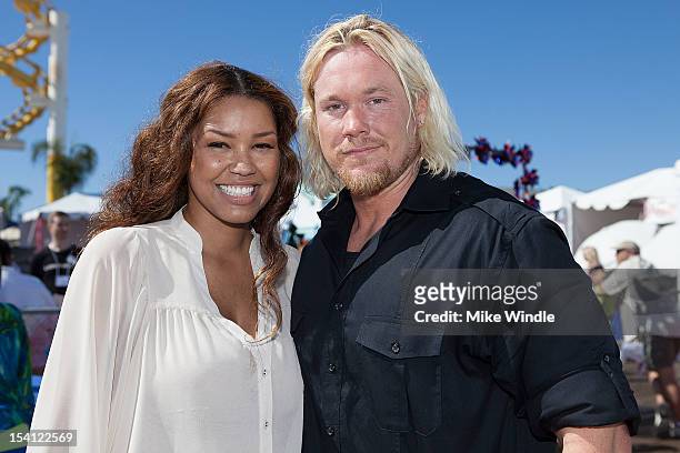 Actress Raquel Bell and athlete Breaux Greer pose during the Special Olympics Southern California 14th Annual Pier Del Sol Event at Santa Monica Pier...