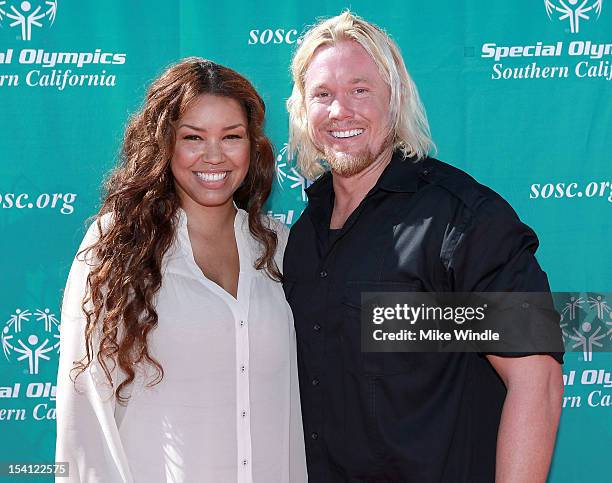 Actress Raquel Bell and athlete Breaux Greer pose during the Special Olympics Southern California 14th Annual Pier Del Sol Event at Santa Monica Pier...