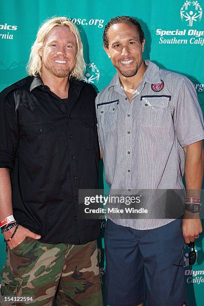 Athlete Breaux Greer and Josh Johnson pose during the Special Olympics Southern California 14th Annual Pier Del Sol Event at Santa Monica Pier on...