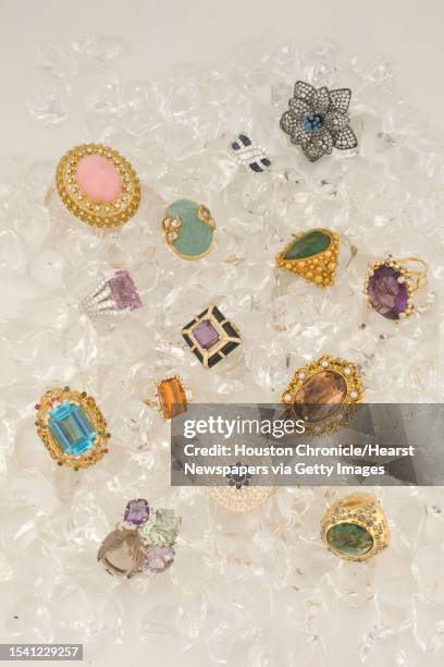 Clockwise, from top left: Nancey Chapman's huge pink opal with diamonds and yellow gold, $16 Sloan/Hall; Nancey Chapman's carved blue aquamarine with...