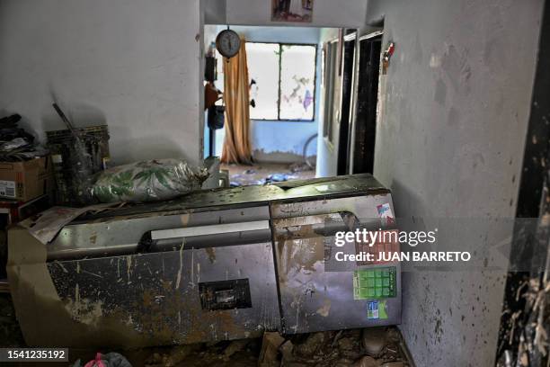 View of the inside of a house after a landslide in the Quetame municipality, Cundinamarca department, Colombia, on July 18, 2023. Rescue teams with...