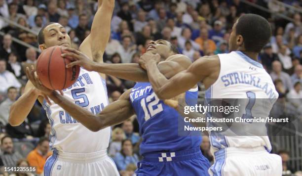 University of North Carolina guard Kendall Marshall , and University of North Carolina guard Dexter Strickland try to stp a streaking University of...