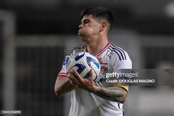 Colo-Colo's midfielder Esteban Pavez reacts after receiving a goal during the Copa Sudamericana round of 32 knockout play-offs second leg football...
