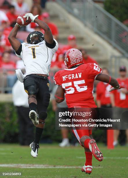 University of Southern Mississippi wide receiver Tracy Lampley makes a midfield grab as he was able to get behind University of Houston linebacker...