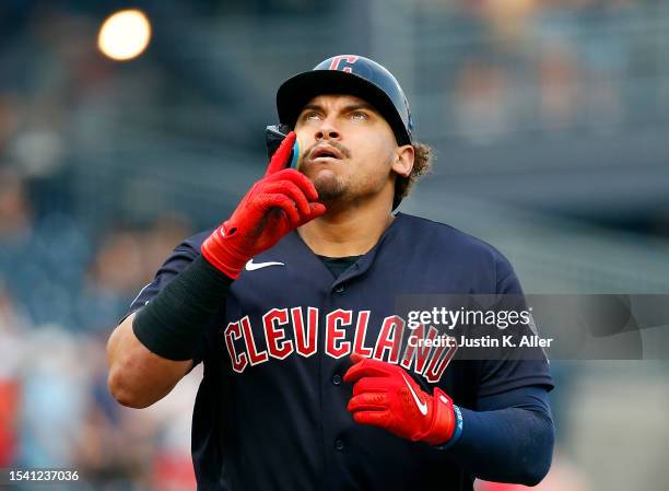 Josh Naylor of the Cleveland Guardians reacts after hitting a three-run home run in the first inning against the Pittsburgh Pirates during...