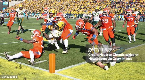 North Dakota State running back Sam Ojuri is stopped short of scoring a touchdown by the Sam Houston State defense during the fourth quarter of the...