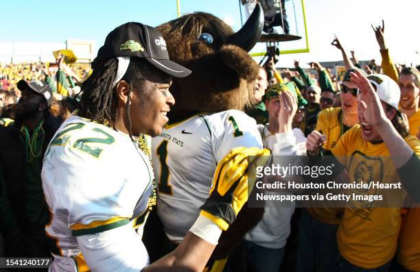 North Dakota State running back Sam Ojuri celebrates with his fans after winning the NCAA Division One Football Championship over Sam Houston State,...