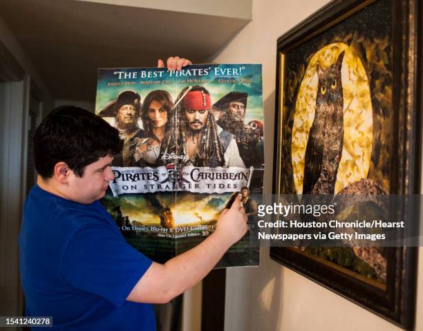 Grant Manier, a collage artist who has autism , explains that he used almost 70 discarded Pirates of the Caribbean poster to make his collage "The...