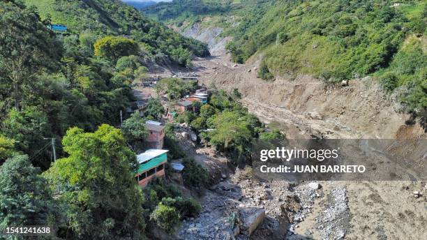 Aerial view of the site of a landslide in the Quetame municipality, Cundinamarca department, Colombia, on July 18, 2023. Rescue teams with drones...