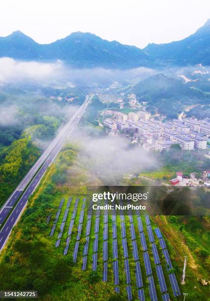 Photovoltaic power generation in a village in Yuexi County, Anqing City, Anhui Province, China, July 19, 2023.