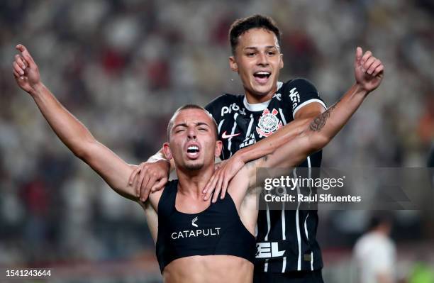 Ryan de Lima of Corinthians celebrates with teammate Matheus Araujo after scoring the team's second goal during the second leg of the round of 32...