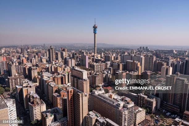General view of the Johannesburg skyline from the 54th floor of Ponte City, also known as Ponte Tower, in Berea, Johannesburg on April 19, 2023. The...