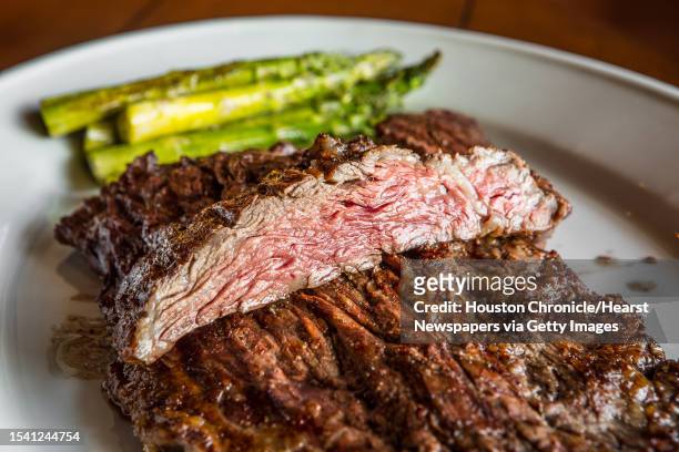 Saltillo's Tapa de Lomo, specially trimmed ribeye cap with grilled asparagus, shot Tuesday, July 11 in Houston.