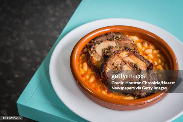 Giacomo's Cibe e Vino's Porchetta E Fagioli, pork butt and cannellini beans, photographed Wednesday, Aug. 2 in Houston.