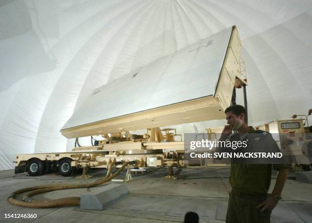 The large radar screen of the Arrow anti-ballistic missile system in its protective tent at the Palmahim air force base south of Tel Aviv 07 November...
