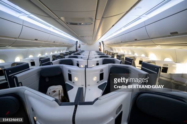 This picture taken on July 18 shows the business class of the new Air France Airbus A350 airplane at the Roissy-Charles-de-Gaulle airport in...