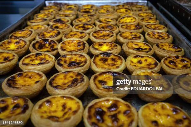 Egg tarts sit on a tray at Lord Stow's bakery in the village of Coloane in Macau on July 19, 2023.