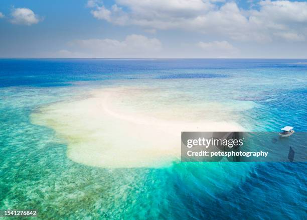 aerial view of a small sand island near ishigaki - ishigaki island stock pictures, royalty-free photos & images