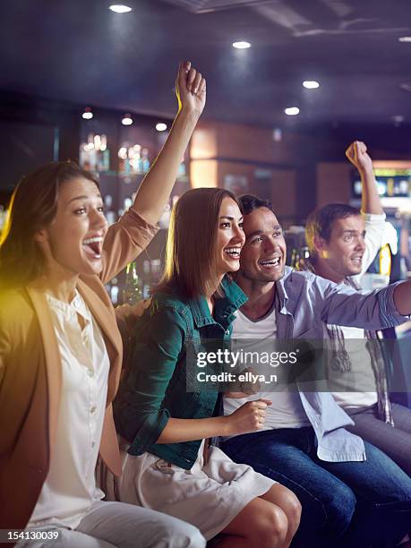 fans at the bar - focus on sport 2012 stock pictures, royalty-free photos & images