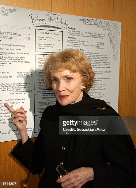 Actress Joan Leslie points at the menu of the legendary Brown Derby Restaurant May 10, 2002 in Los Angeles, CA.