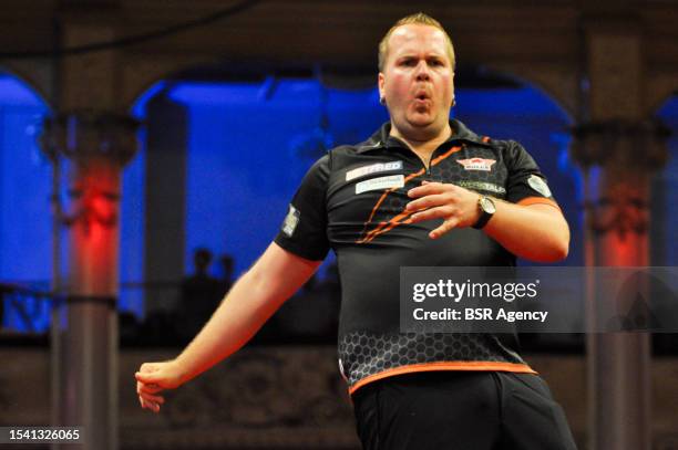 Dirk van Duijvenbode of the Netherlands during Day 2 of the 2023 Betfred World Matchplay at the Winter Gardens on July 16, 2023 in Blackpool, United...