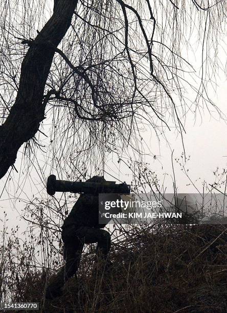 Soldier aims his anti-tank missile luncher during an exercise, 27 February 2003 in Paju near the inter-Korean border. Some 5,000 US soldiers were...