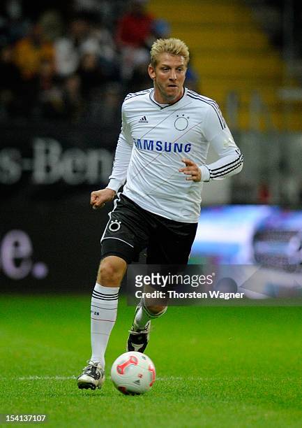 Marco Rehmer of Germany runs with the ball during the century match between Germany and Italy at Commerzbank Arena on October 14, 2012 in Frankfurt...